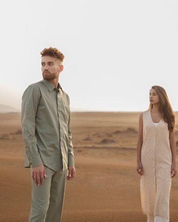 medium-shot-couple-posing-desert